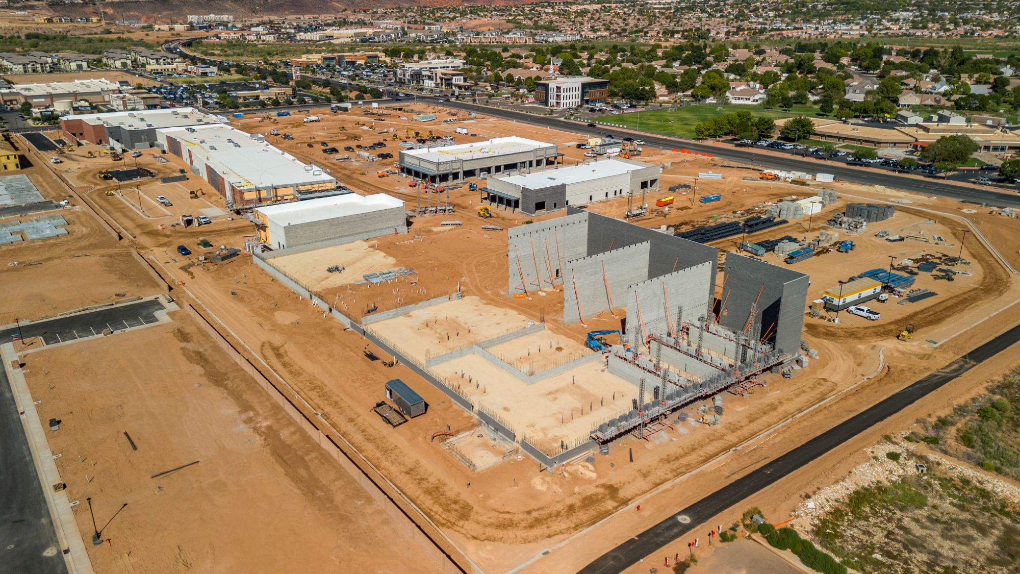 Aerial view of tilt-up concrete panels being set for the entertainment building at The Paseo